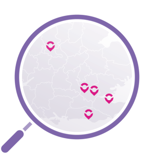 A magnifying glass highlights a map with pink location pins, indicating specific sites or areas of interest.